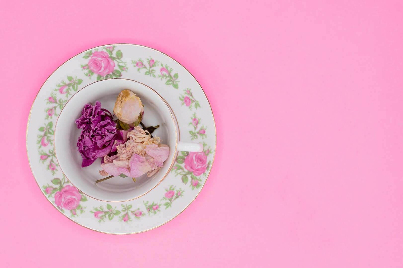 Pretty vintage teacup on pink background