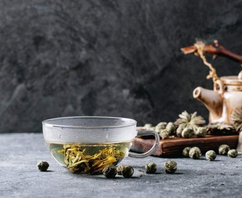 Green tea with ceramic teapot